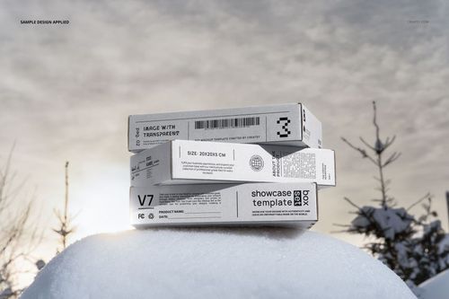 Winter edition packaging mockup featuring a group of mailing boxes on snow, shown from a front angled perspective.