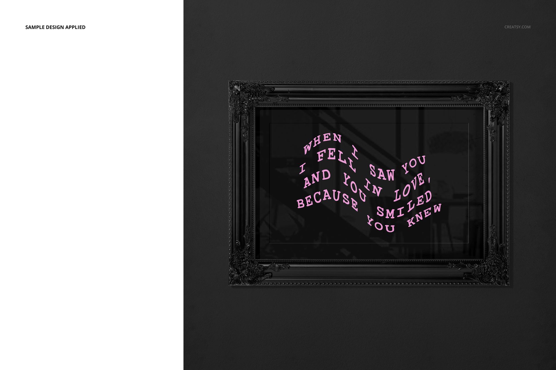 Front view of a classic black painted picture frame mockup on a dark wall, displaying curved pink text artwork.