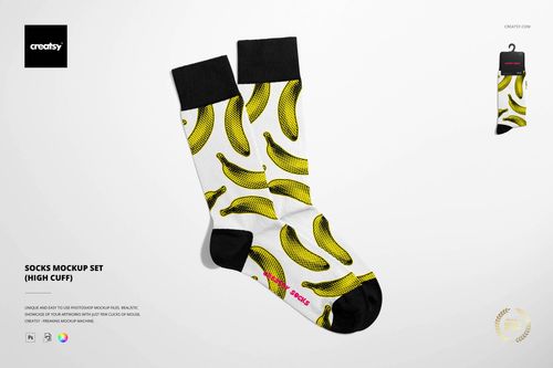 High cuff socks mockup with a white base, black cuffs and toes, featuring a repeating yellow banana pattern, front view.
