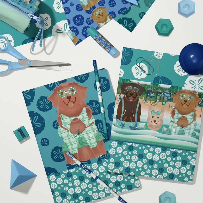 Stationery mockup with two classic A4 notebooks featuring illustrated animal covers, surrounded by blue and teal office supplies.