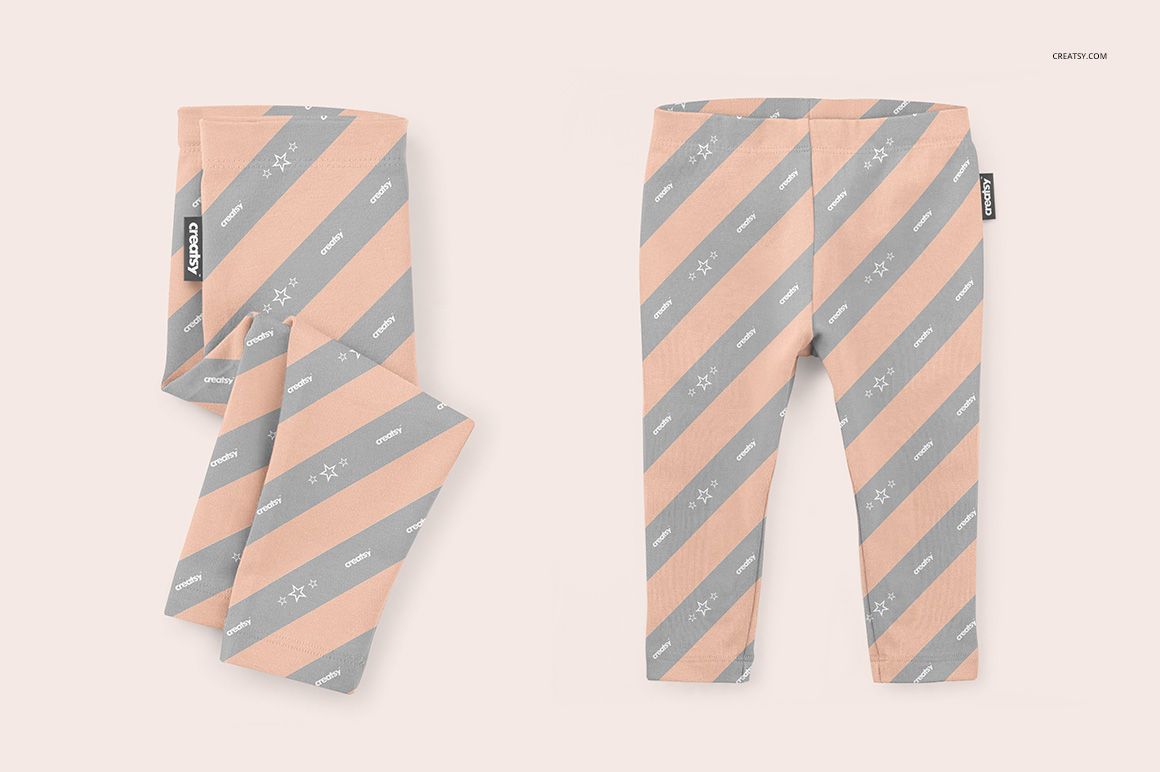 Front view of baby leggings mockup with diagonal peach and gray stripes, displayed on a light background.