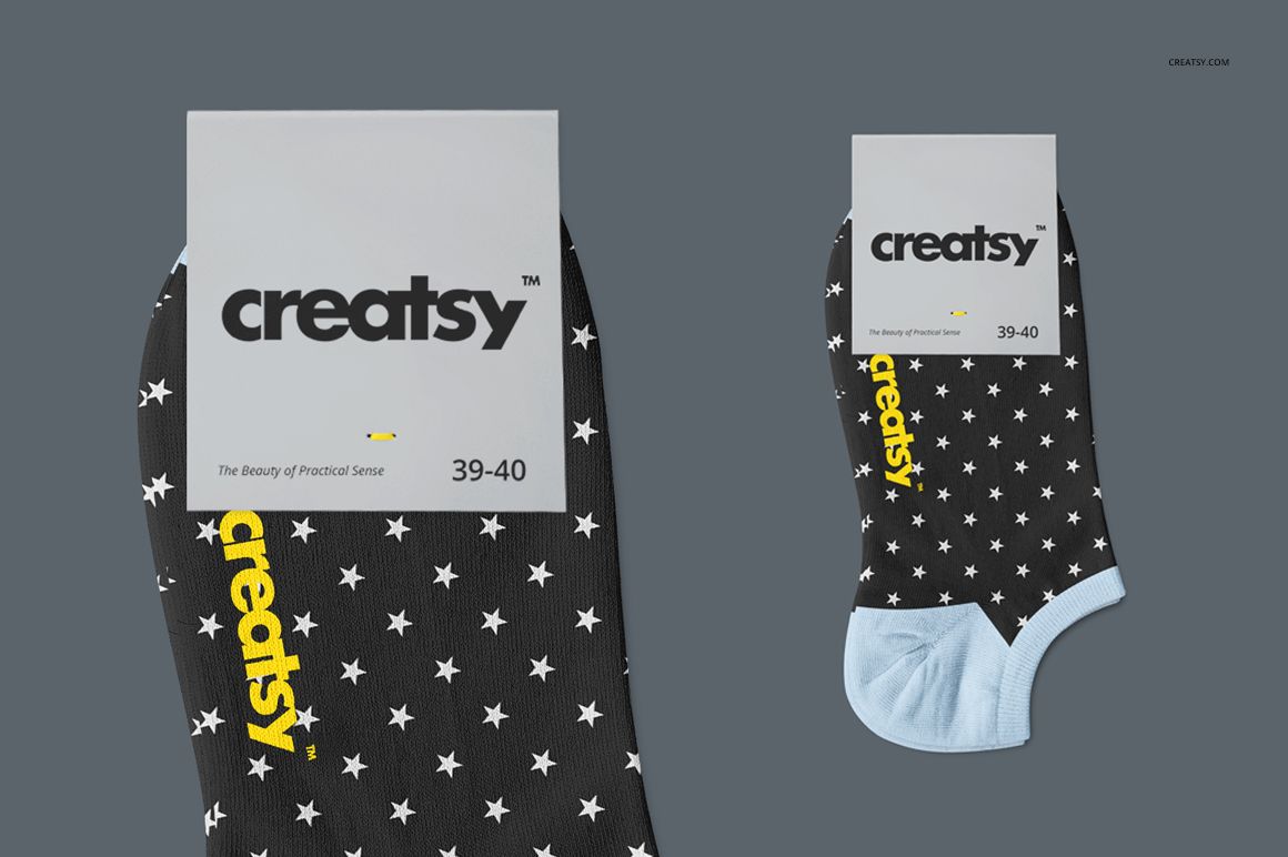 Low cut socks mockup featuring a black sock with white star pattern, yellow text, and light blue toe on a gray background.
