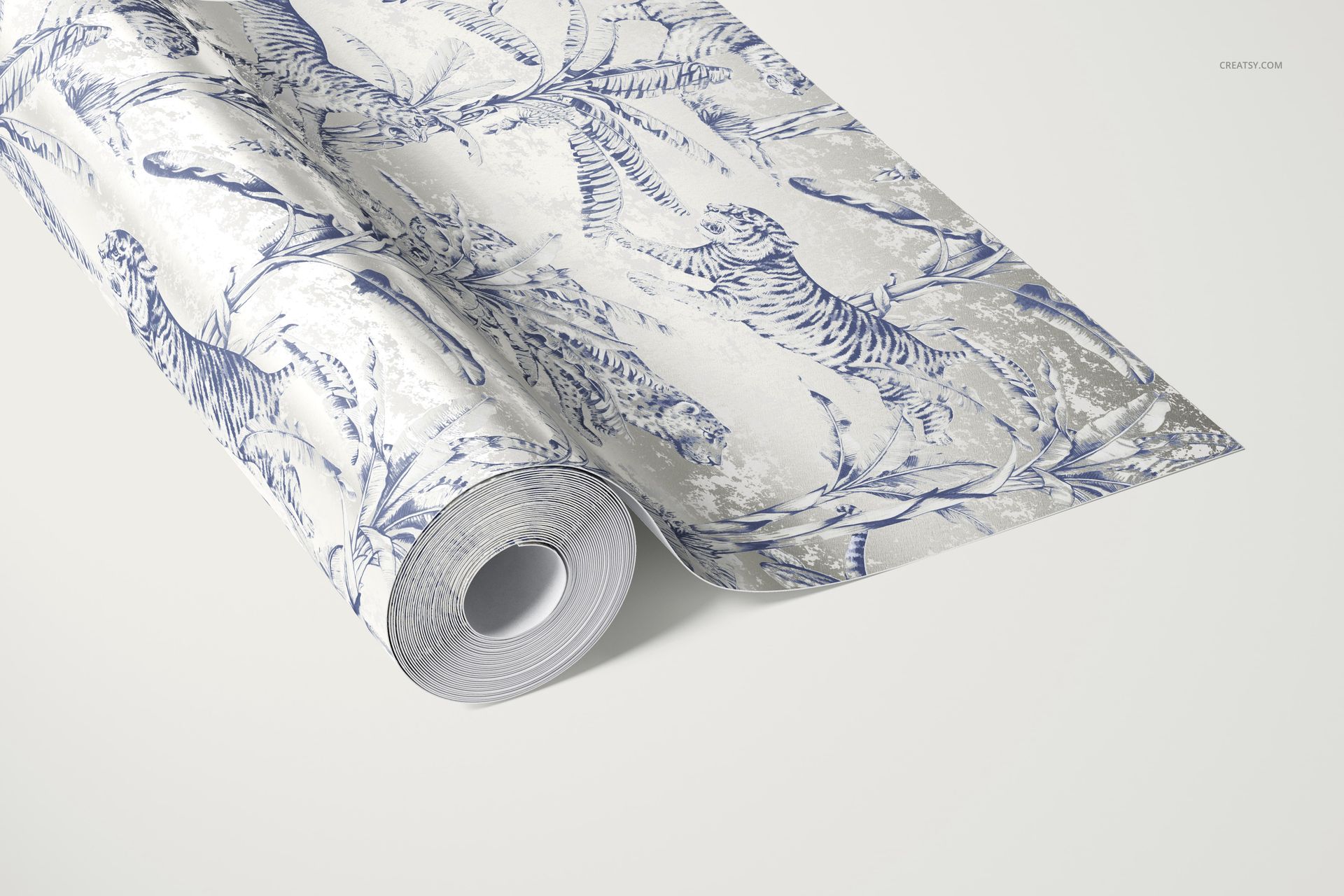 Blue and white patterned wallpaper roll with botanical and tiger motifs, displayed in a mockup on a light background.