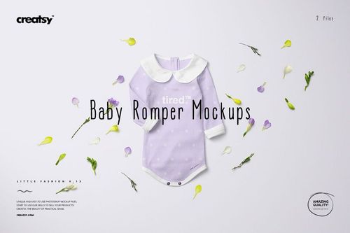 PSD mockup showing a baby romper in pastel purple with white trim, arranged with assorted petals on a neutral surface.
