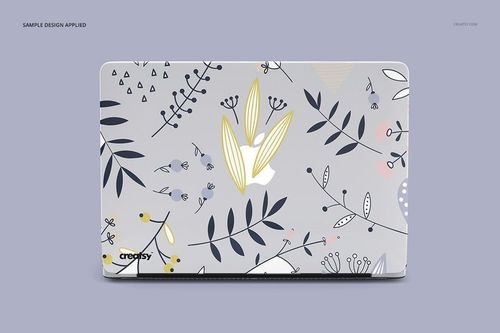 Front view of a Macbook clear case mockup with a floral and leaf design on a light gray background, set against a plain backdrop.
