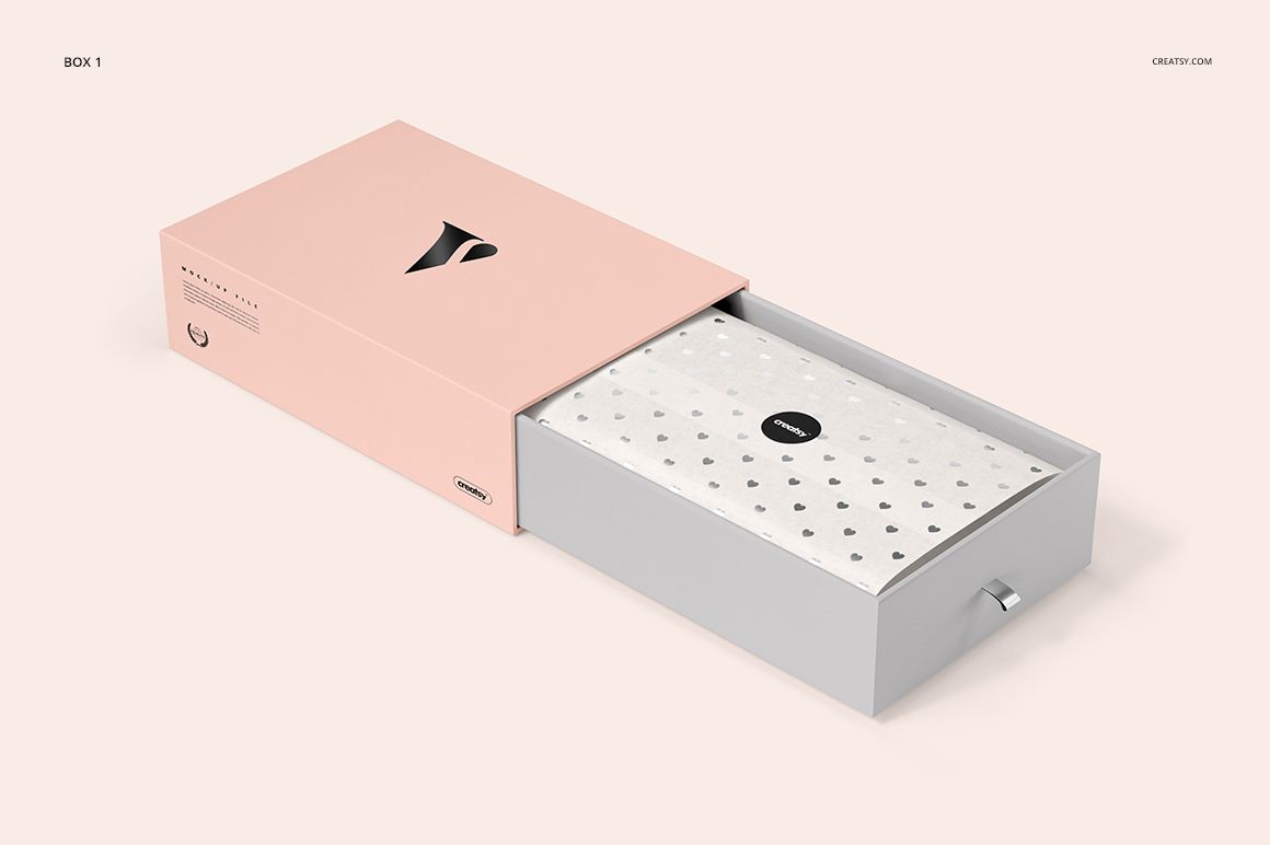 Gift box mockup with a sliding drawer design, featuring a pink outer sleeve and a gray inner box on a light background.