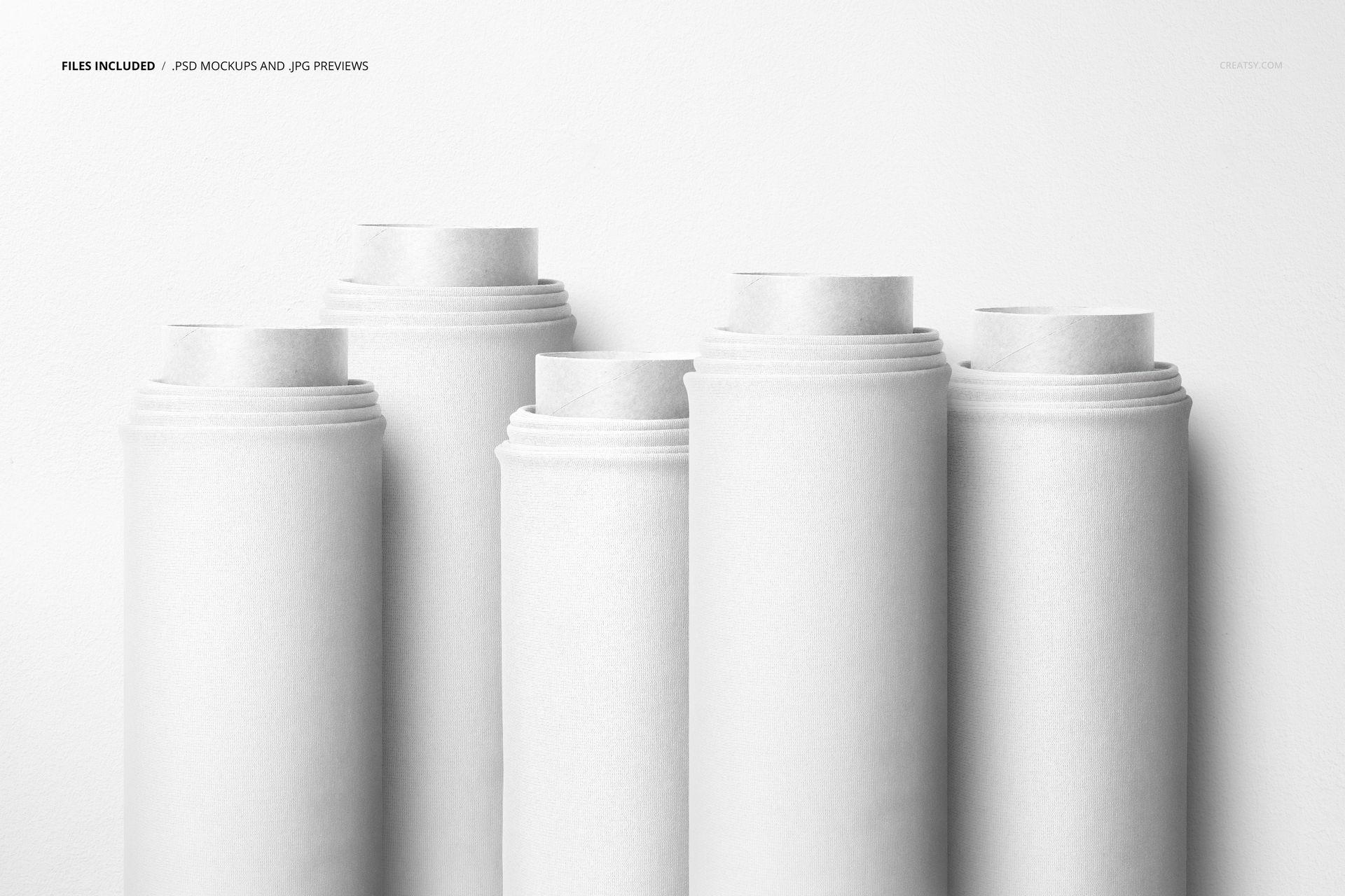 Group of five plain fabric rolls displayed upright, evenly spaced in front of a smooth white wall, PSD mockup format.