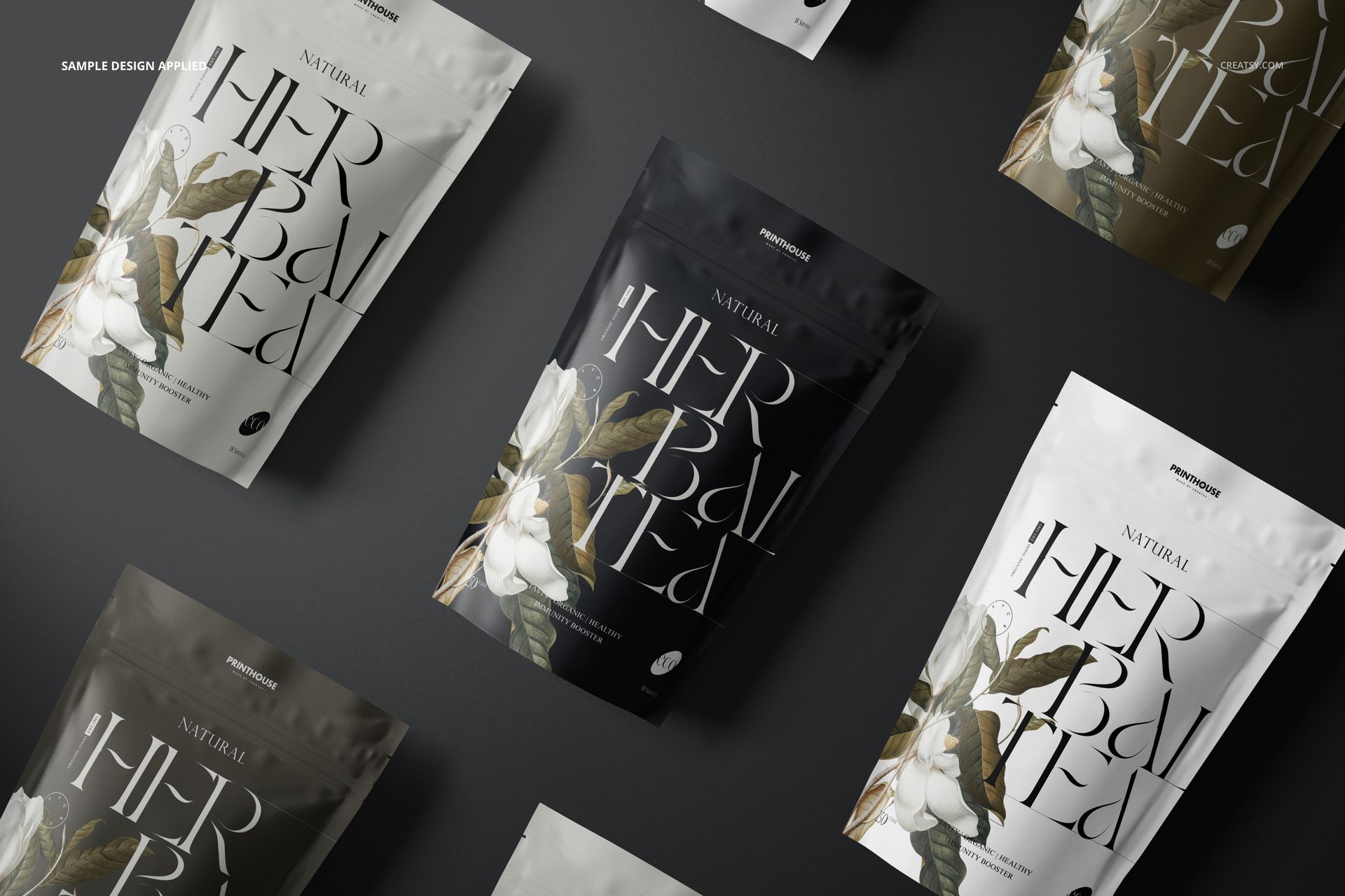 Multiple stand up zip lock bag mockups arranged diagonally, each with botanical illustrations and large text labels.