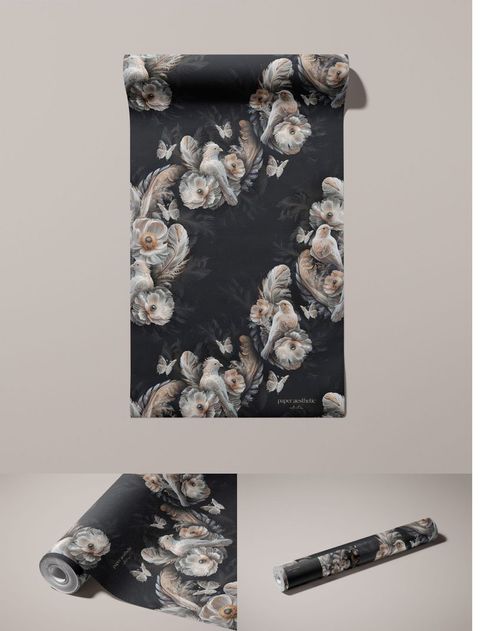 Rolled non-woven vinyl wallpaper mockup with a dark floral pattern, shown from a front view and close-up angle.