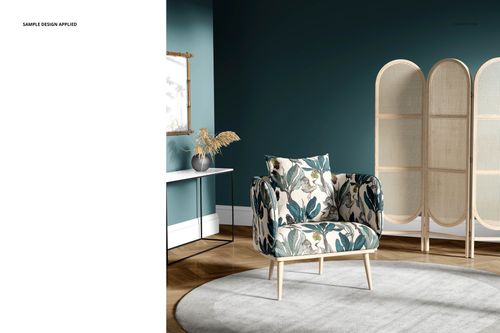 Front view of a floral armchair mockup in a modern room, featuring a decorative screen and console table.