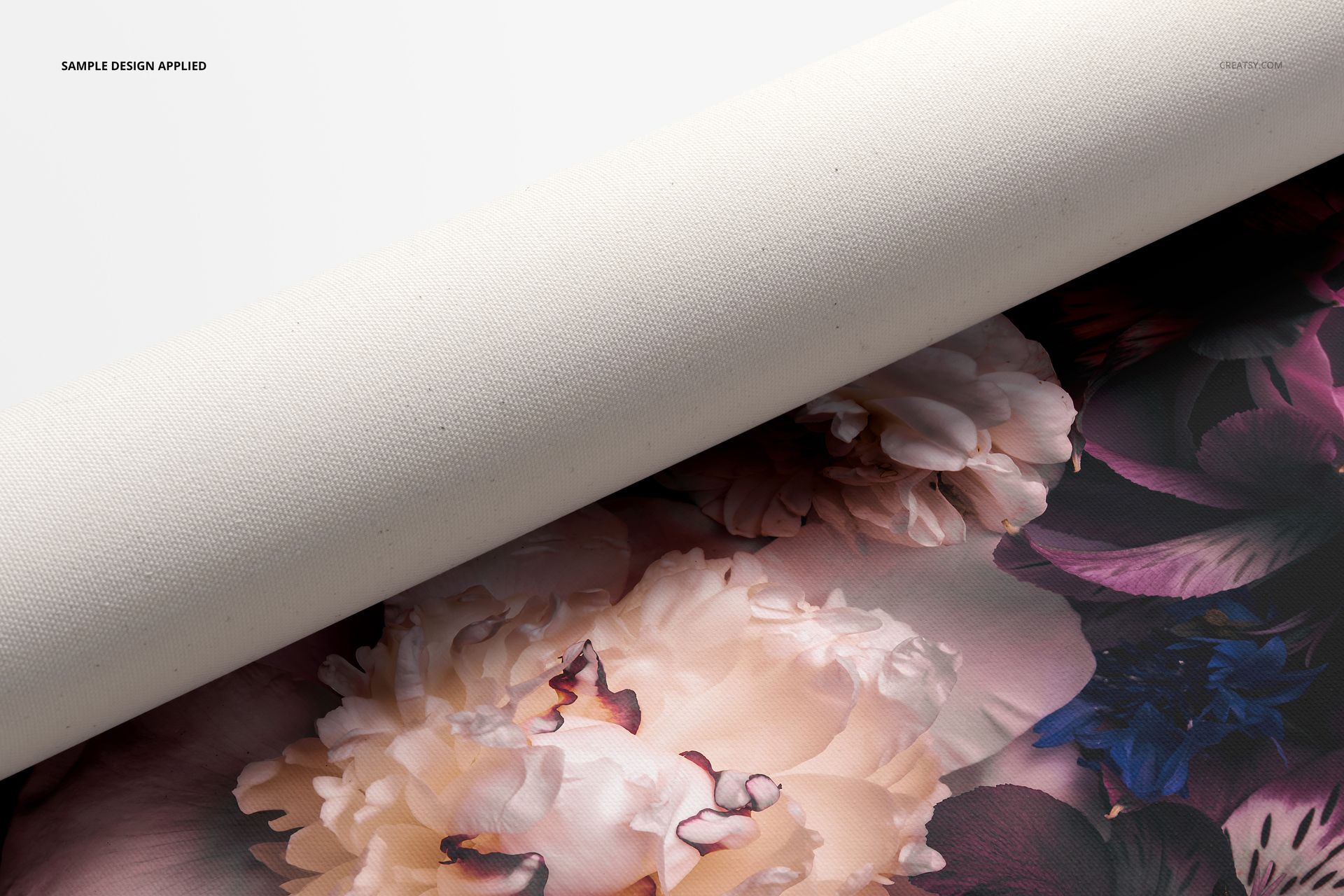 PSD mockup of a rolled canvas print with visible textured surface and detailed flower pattern in soft pastel tones.