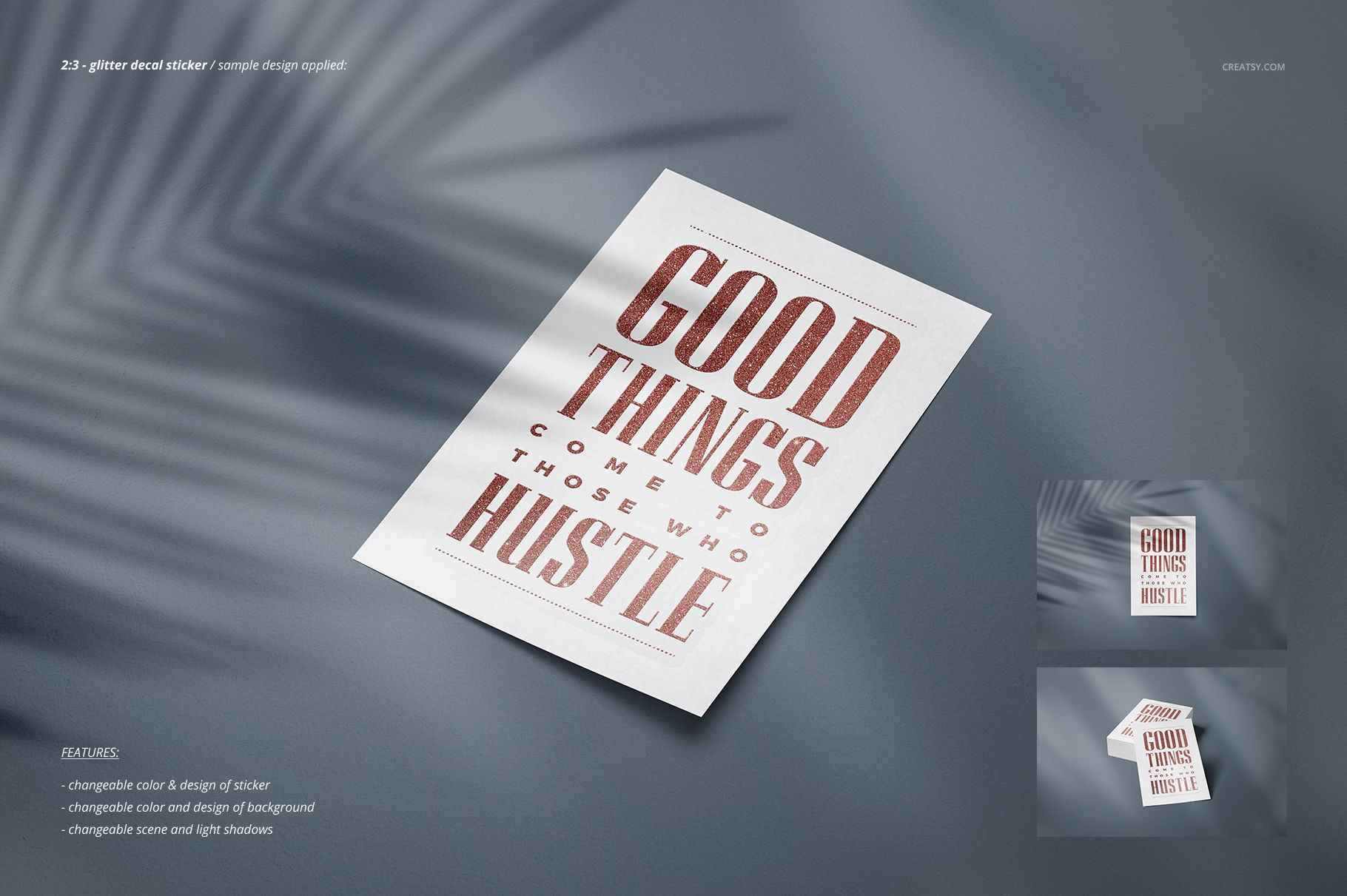 Rectangular decal sticker mockup with metallic text lying on a light surface, viewed from above with soft shadows.