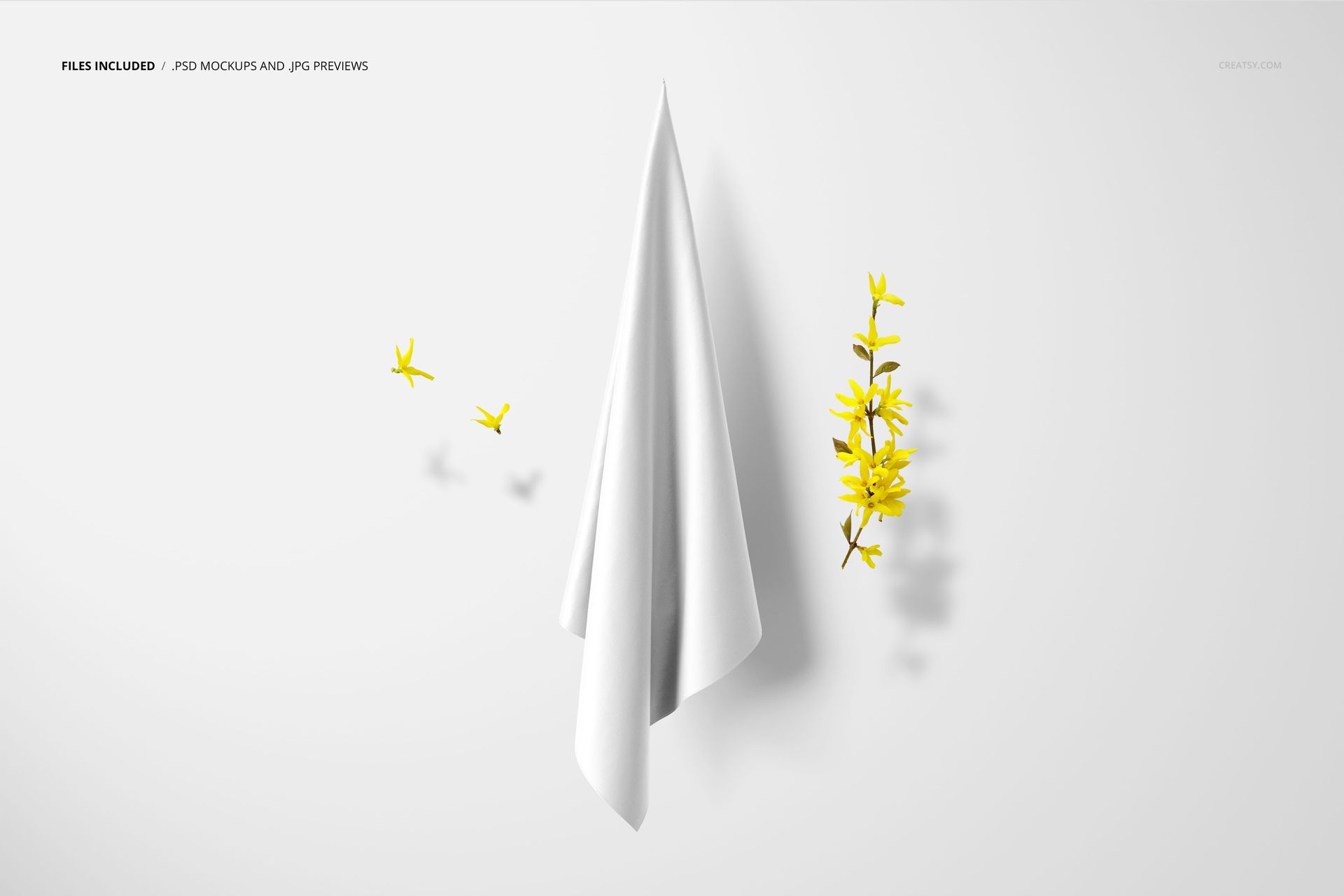 White silk scarf mockup hanging vertically, shown from the front, with yellow floral accents on a light surface.