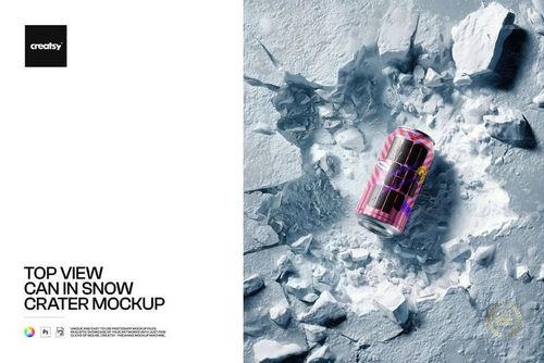PSD mockup showing a drink can with vivid colors lying in a snow crater, encircled by broken ice pieces.