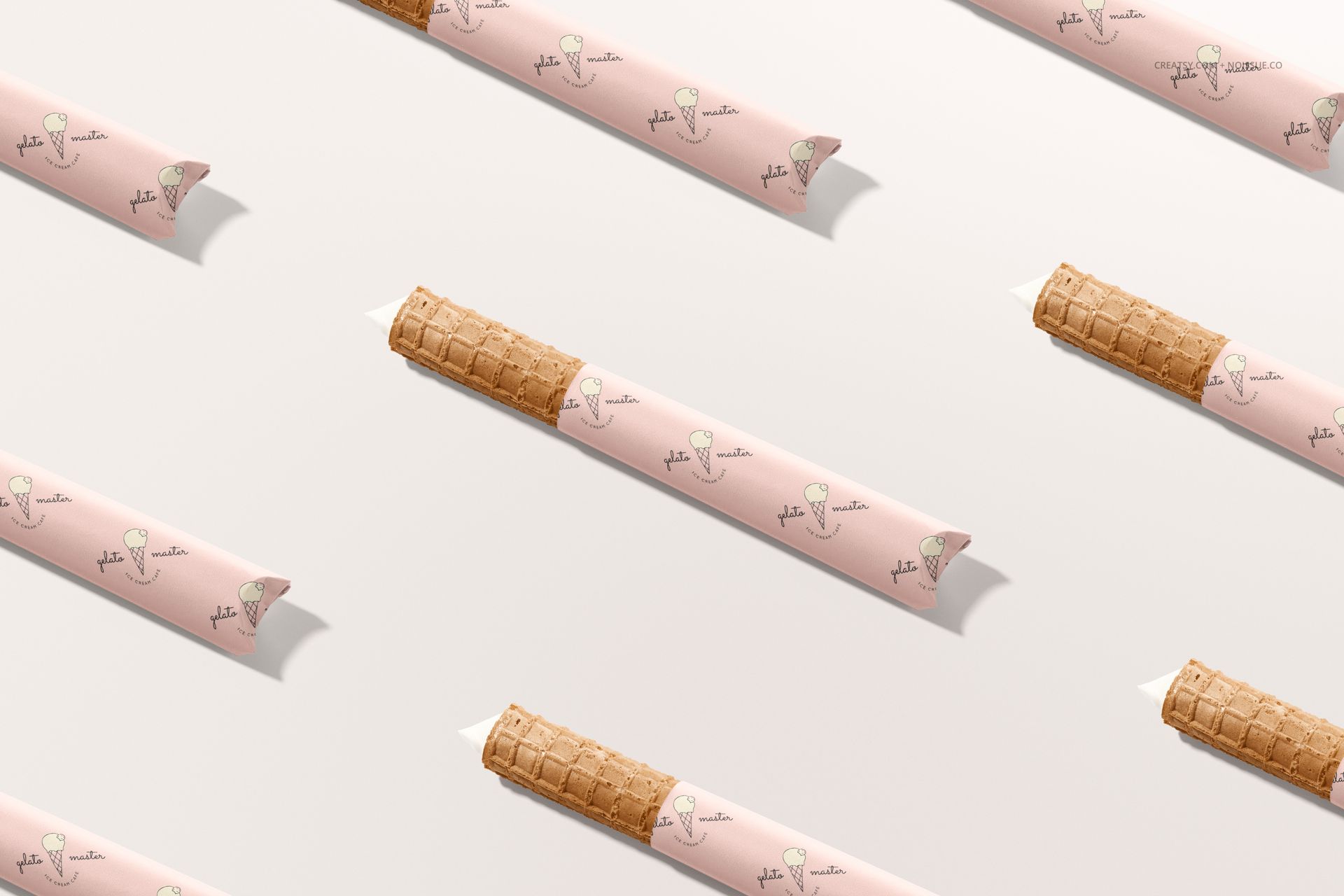 PSD mockup of ice cream wafer rolls with decorative pink wrappers and playful ice cream motifs, displayed in a repeating pattern.