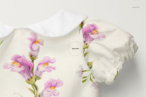 Front close-up of a baby romper mockup with short puff sleeves, white collar, and pink floral pattern on cream fabric.