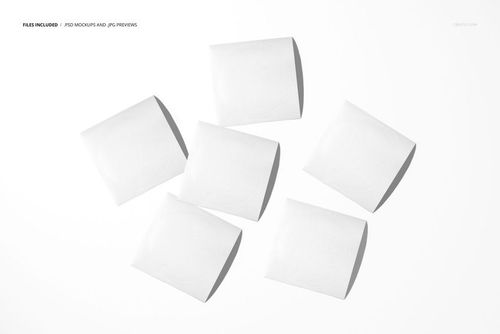 Top view of six round white stickers arranged on a clean white surface, shown in a packaging mockup scene.
