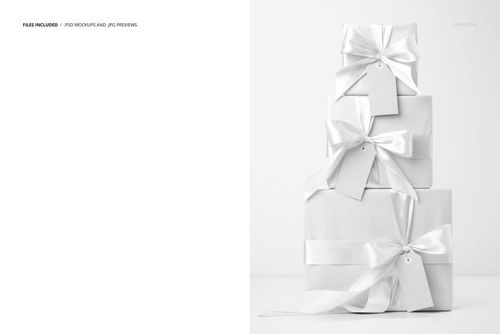 PSD mockup featuring a trio of elegant Christmas presents, tied with glossy bows and empty tags on a light background.