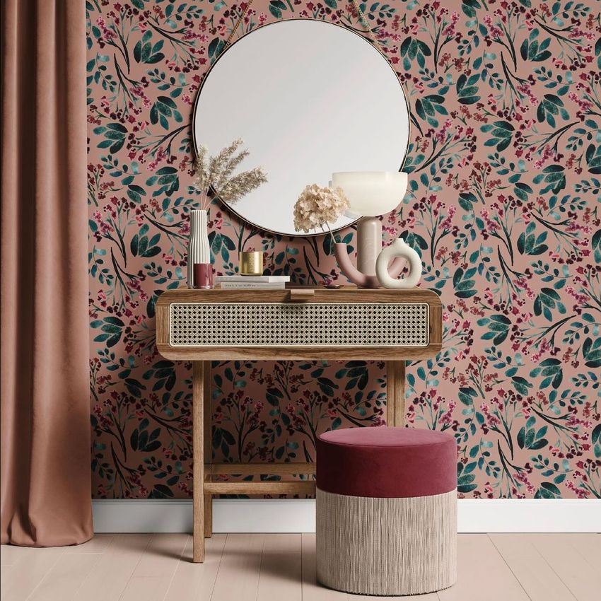 Dressing table mockup featuring a round mirror, decorative objects, and a pink floral wallpaper background.