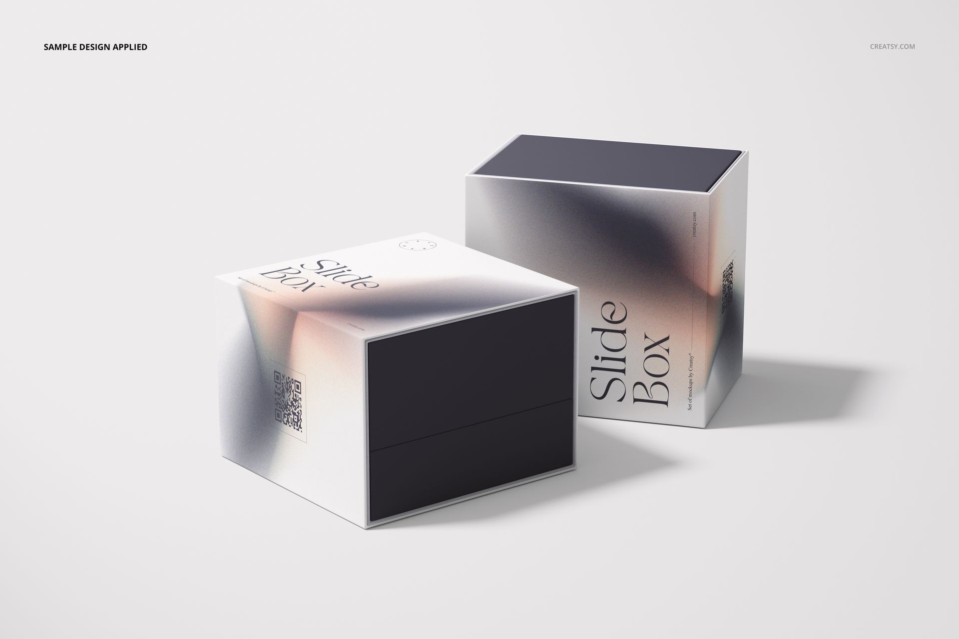 Two rectangular slide gift boxes with abstract gradient design, shown on a light surface in a PSD mockup scene.