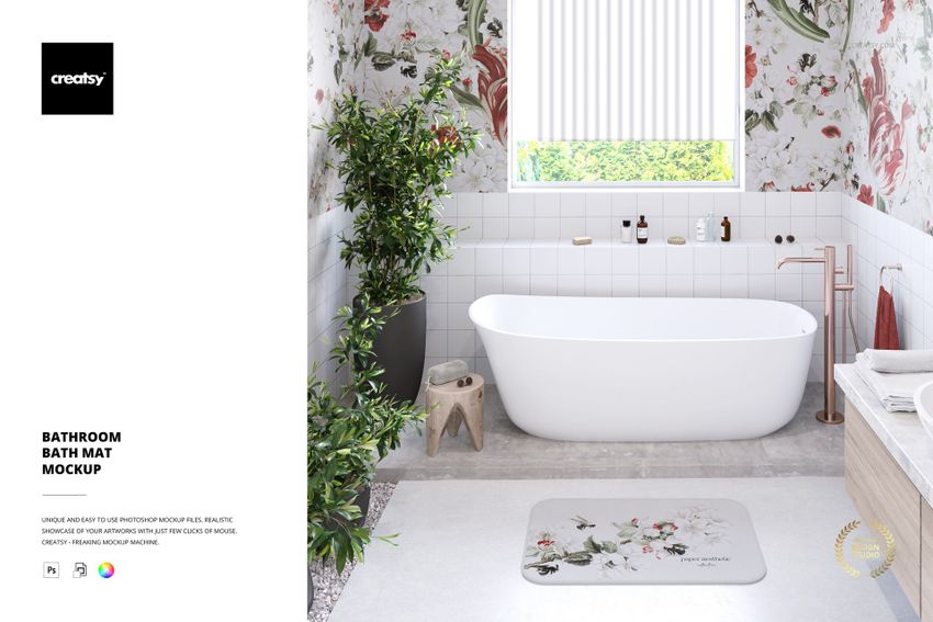 Floral bathmat mockup on a gray floor in a modern bathroom with white tub, green plants, and large window.