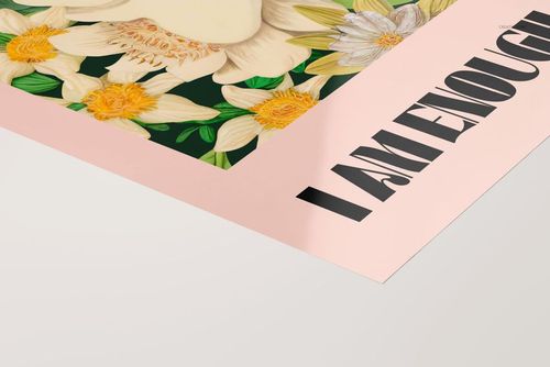 Glossy PVC poster mockup featuring a close-up of a pink border, floral illustration, and bold black text.