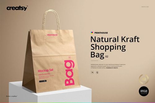 Front view of a natural kraft shopping bag mockup with rope handles, featuring pink text and minimal design.