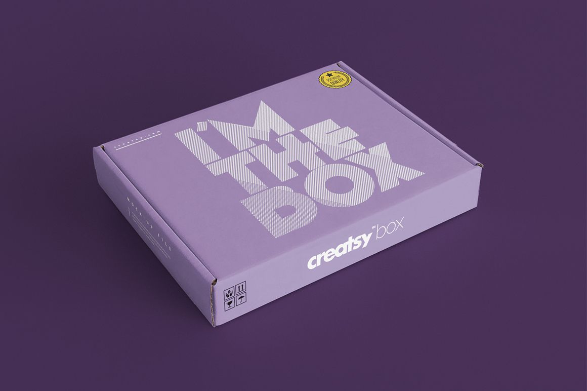 Mailing box mockup featuring a lavender color and large geometric lettering, displayed at an angle on a solid surface.