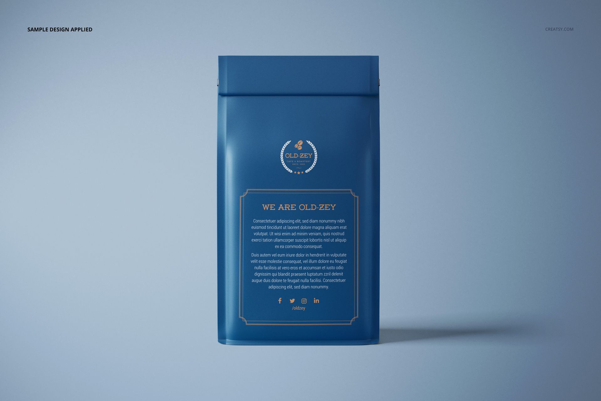 Blue paper coffee bag mockup shown upright with a centered label, minimal background and soft lighting.