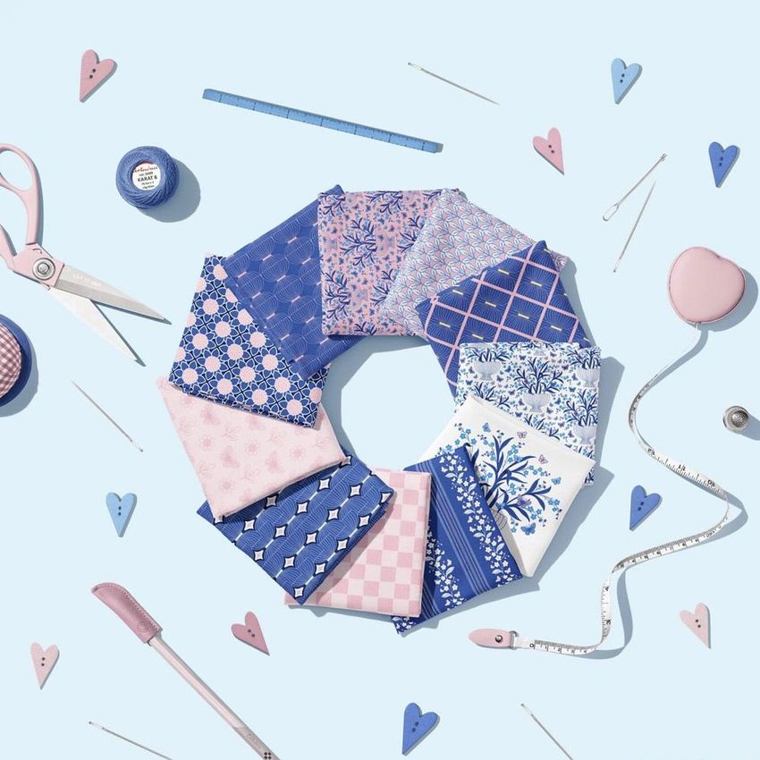 Jersey fabrics mockup arranged in a circular layout on a light blue background, featuring blush and indigo patterns.