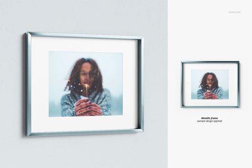 Front view of a metallic deep frame mockup with a white matte border, displayed on a light wall background.