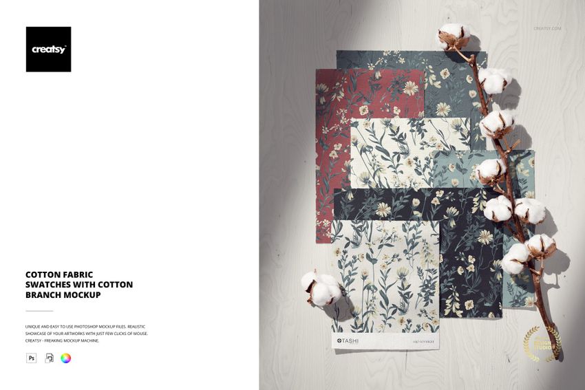 PSD mockup showing assorted floral cotton fabric swatches and a cotton branch laid out on a light wood tabletop.