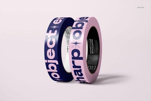 Mockup of two narrow duct tape rolls, one navy blue and one pastel pink, both with large text designs, front angle.