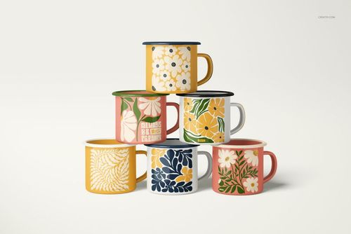 Front view of enamel mug mockup set with vibrant nature-inspired patterns in a pyramid formation on a neutral surface.