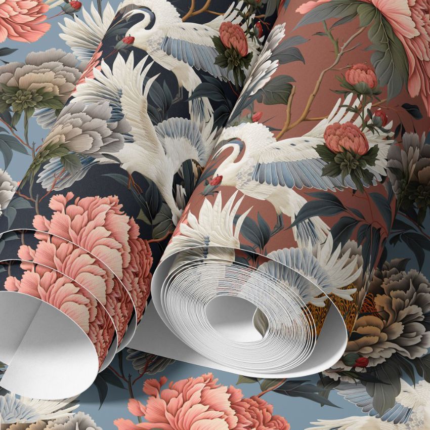 Paper wallpaper mockup featuring rolled sheets with a detailed peony and crane pattern in muted blue, pink, and cream tones.