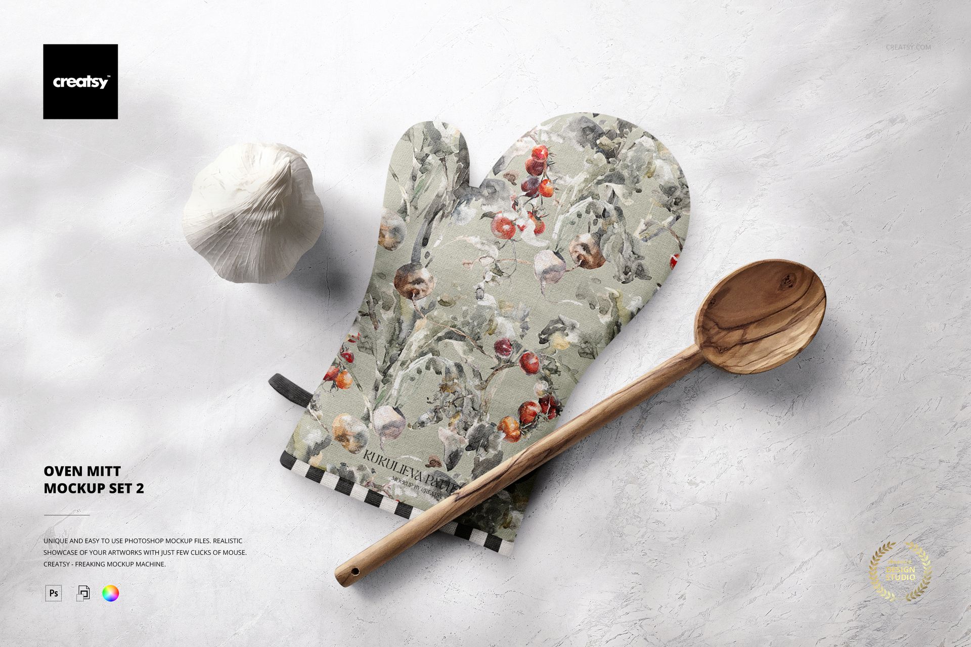 Floral-patterned oven mitt mockup placed on a neutral background with a wooden spoon and garlic as props.