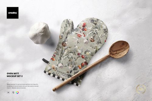 Floral-patterned oven mitt mockup placed on a neutral background with a wooden spoon and garlic as props.