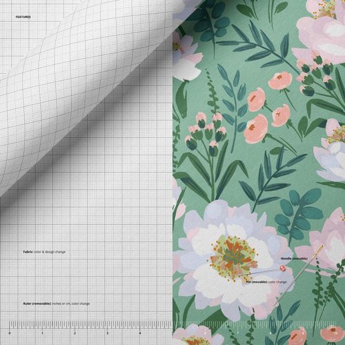Close-up view of jersey fabric mockup featuring a green background with floral patterns and technical grid details.