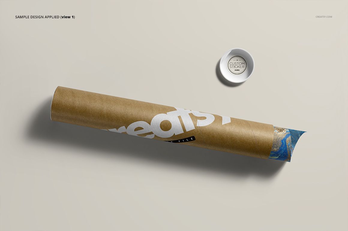 Mailing tube mockup featuring a kraft paper tube with white lettering, viewed from above on a neutral background.