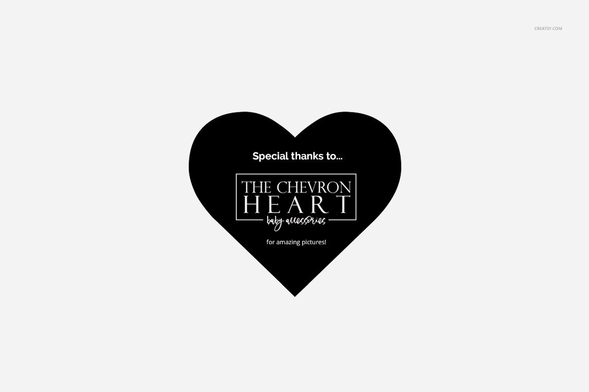Black heart-shaped graphic with white text centered on a plain light gray background, viewed from the front.