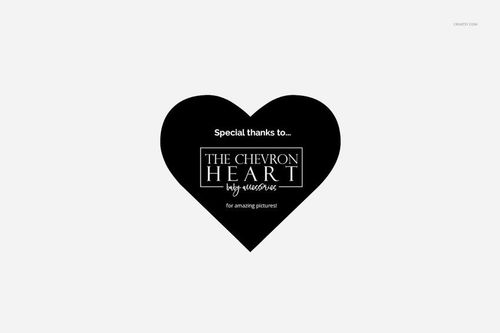 Black heart-shaped graphic with white text centered on a plain light gray background, viewed from the front.