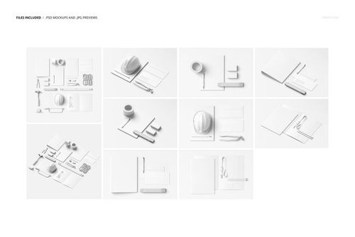 Set of construction company stationery and tools mockups arranged on a white surface, viewed from above.