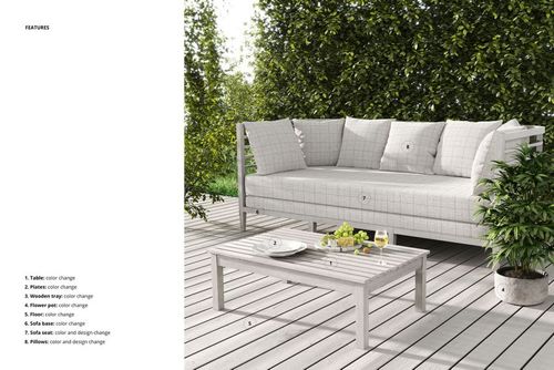 Front view of a light gray sofa mockup with patterned pillows and a rectangular table, set in a lush outdoor garden.
