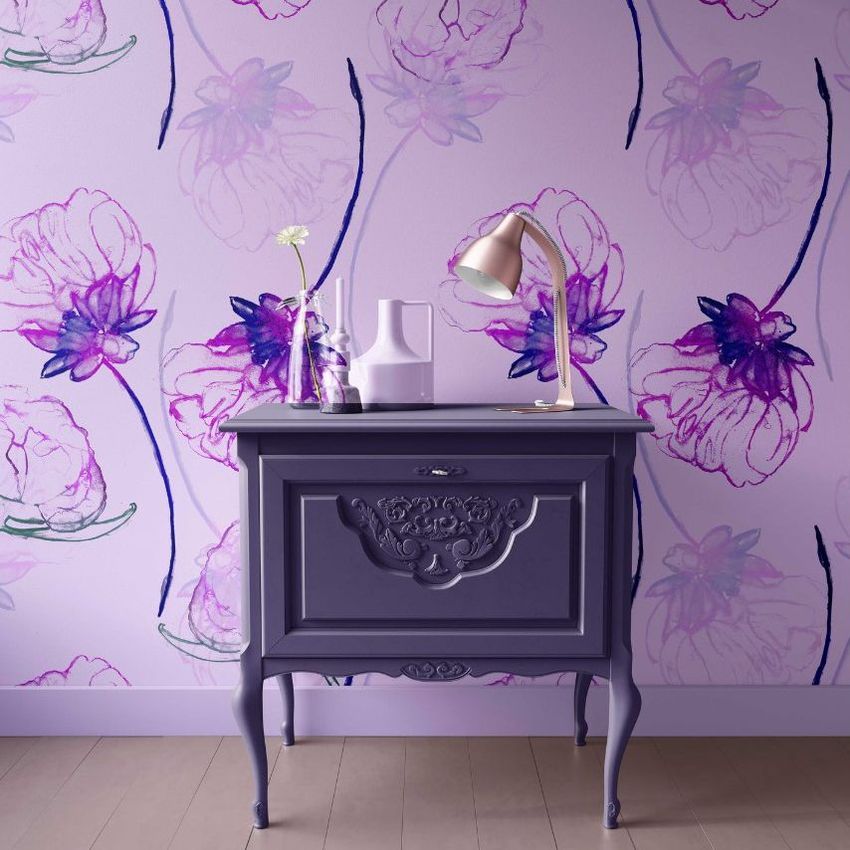 Interior scene mockup featuring a purple vintage nightstand against a wall with a pink and purple floral pattern wallpaper.