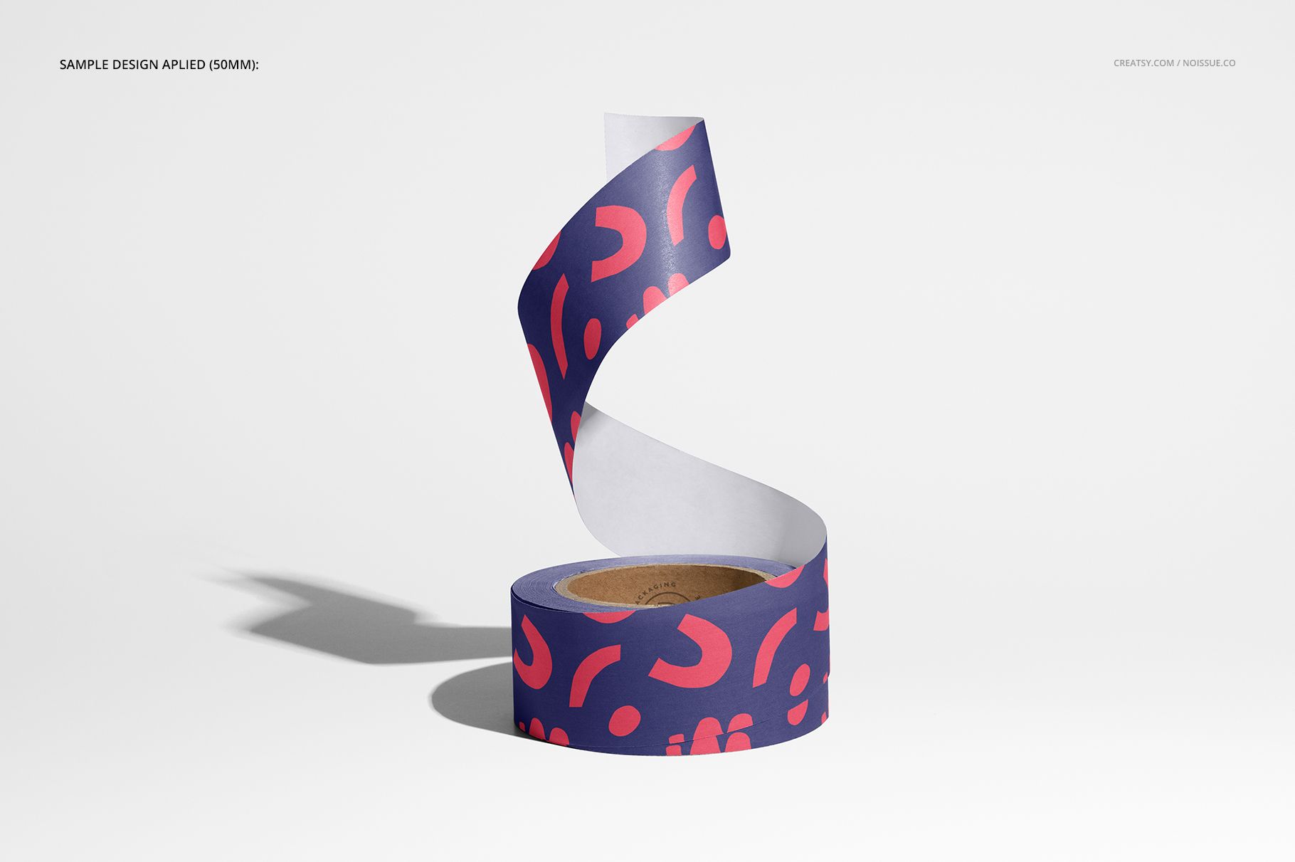 Packing tape mockup featuring a partially unrolled tape with bold purple and pink abstract design, front view.