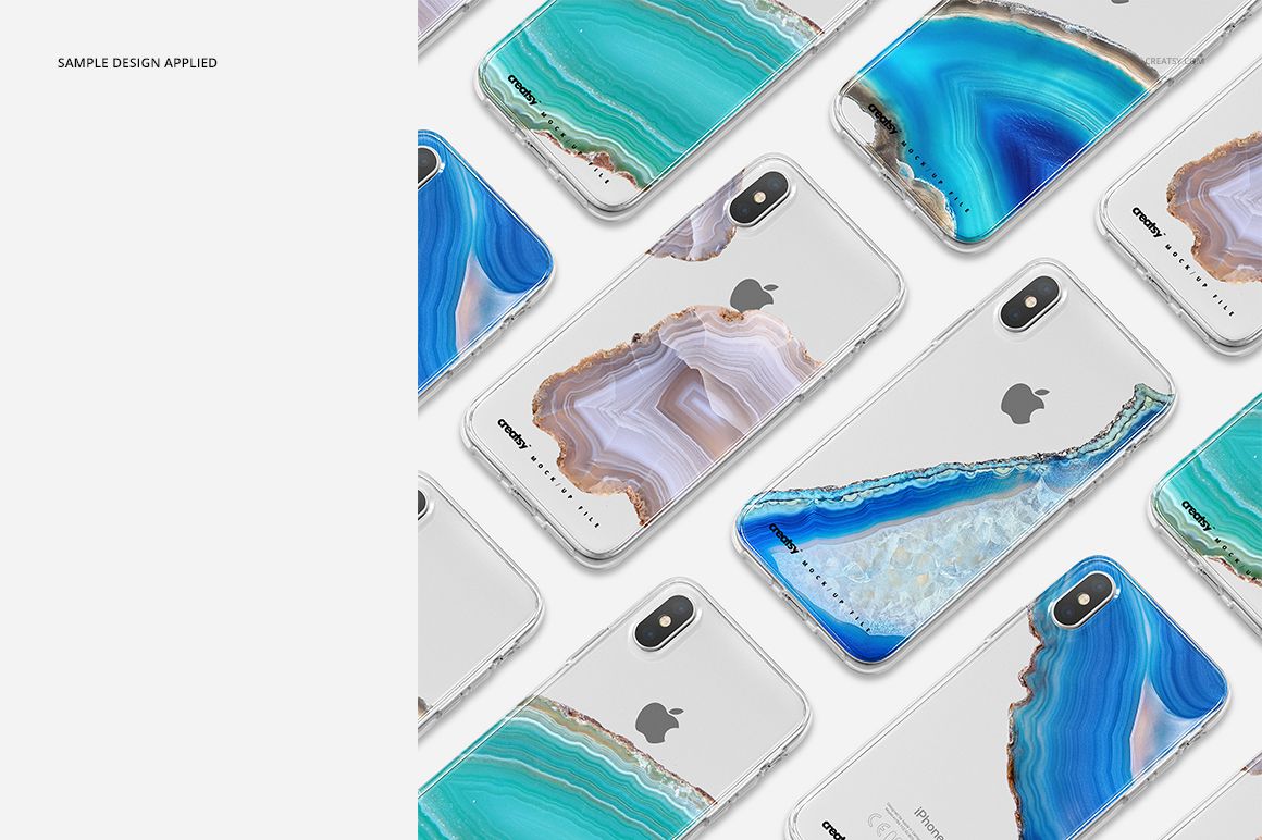 PSD mockup of multiple clear iPhone X cases with blue and neutral mineral patterns on silver phones, top view on white background.