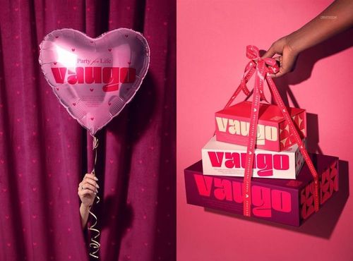 Valentine's Day themed PSD mockup featuring a hand holding a heart balloon and stacked packaging boxes with vibrant colors.