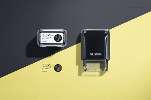 Self-inking stamps mockup set featuring a closed and open stamp on angled yellow and gray surfaces with shadow.
