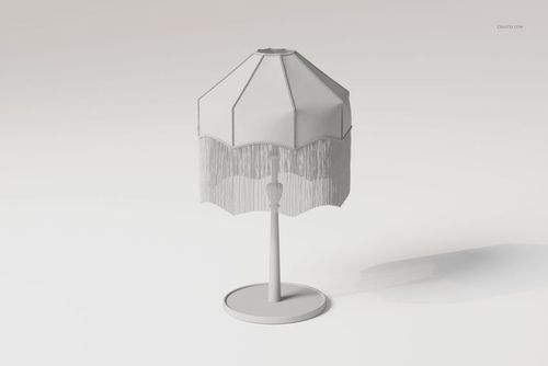 Front view of a tassel shade lamp with a polygonal white lampshade and fringe detail, set on a round base.