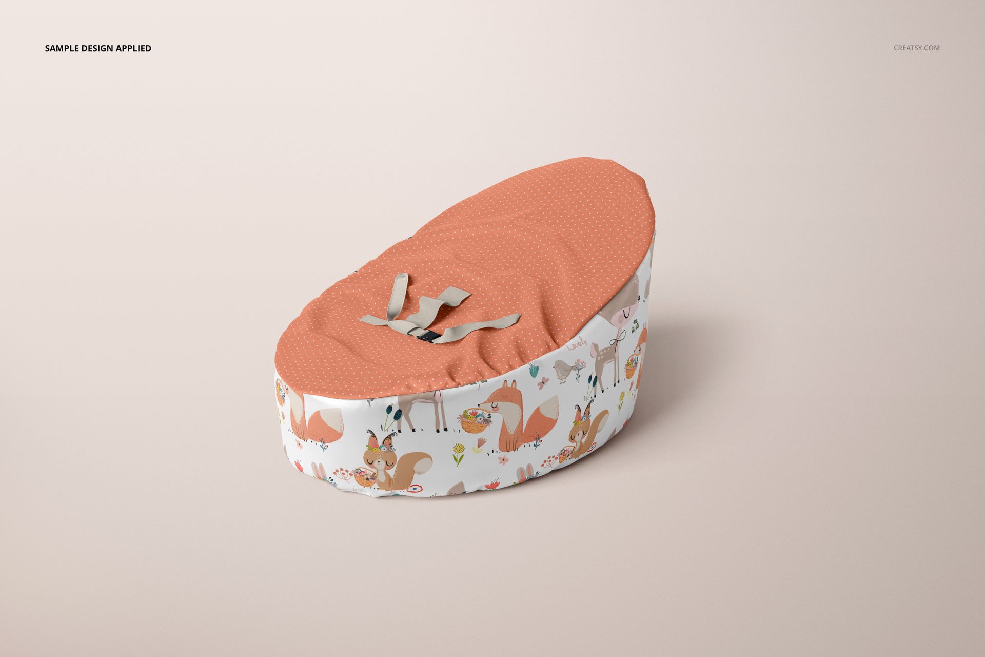 Mockup of a baby bean bag featuring an orange textured surface and illustrated animal designs around the sides.